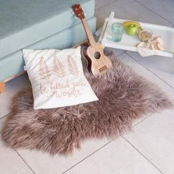 Unshorn Sheepskin Beige 2 ft. x 3 ft. Animal Shape Area Rug by Home Decorators Collection 15 Unshorn Sheepskin Beige 2 ft. x 3 ft. Animal Shape Area Rug by Home Decorators Collection -Home Decorators Store beige home decorators collection area rugs l201040100o2100 31 1000