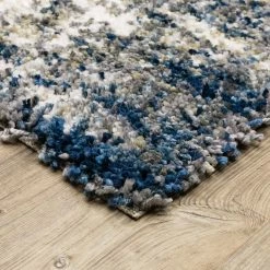 Nordic Blue 10 ft. x 13 ft. Abstract Shag Area Rug by Home Decorators Collection 12 Nordic Blue 10 ft. x 13 ft. Abstract Shag Area Rug by Home Decorators Collection -Home Decorators Store blue home decorators collection area rugs 564644 1d 1000