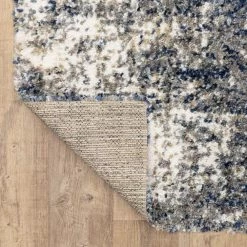 Nordic Blue 10 ft. x 13 ft. Abstract Shag Area Rug by Home Decorators Collection 13 Nordic Blue 10 ft. x 13 ft. Abstract Shag Area Rug by Home Decorators Collection -Home Decorators Store blue home decorators collection area rugs 564644 66 1000