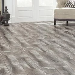 Canmar 12 mm T x 7.48 in W x 47.72 in L Water Resistant Laminate Flooring (19.83 sq. ft. / case) by Home Decorators Collection -Home Decorators Store canmar gray home decorators collection laminate wood flooring hl1352 31 1000