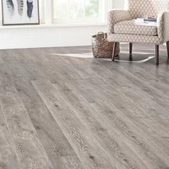Drayton 12 mm T x 7.48 in W x 47.72 in L Water Resistant Laminate Flooring (19.83 sq. ft. / case) by Home Decorators Collection 7 Drayton 12 mm T x 7.48 in W x 47.72 in L Water Resistant Laminate Flooring (19.83 sq. ft. / case) by Home Decorators Collection -Home Decorators Store drayton gray home decorators collection laminate wood flooring hl1350 31 1000