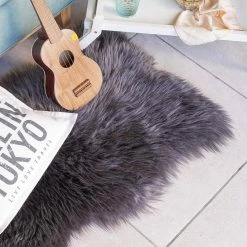 Unshorn Sheepskin Grey 2 ft. x 3 ft. Animal Shape Area Rug by Home Decorators Collection 12 Unshorn Sheepskin Grey 2 ft. x 3 ft. Animal Shape Area Rug by Home Decorators Collection -Home Decorators Store grey home decorators collection area rugs l201470000o2600 1d 1000