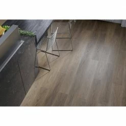McKinney Walnut 7.20 in. W x 42 in. L SPC Waterproof Vinyl Plank Flooring (25.20 sq. ft./Case) by Home Decorators Collection 8 McKinney Walnut 7.20 in. W x 42 in. L SPC Waterproof Vinyl Plank Flooring (25.20 sq. ft./Case) by Home Decorators Collection -Home Decorators Store mckinney walnut home decorators collection vinyl plank flooring hd19004 4f 1000