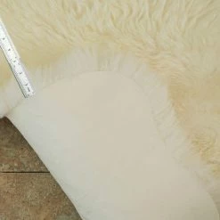 Unshorn Sheepskin White 2 ft. x 3 ft. Animal Shape Area Rug by Home Decorators Collection 15 Unshorn Sheepskin White 2 ft. x 3 ft. Animal Shape Area Rug by Home Decorators Collection -Home Decorators Store natural white home decorators collection area rugs l20101010000000 66 1000